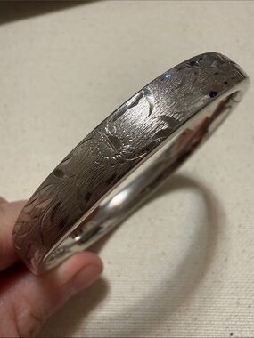 Napier Silver-toned Floral Engraved Bangle Bracelet